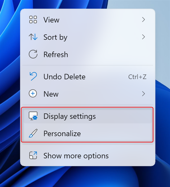 Right-click the desktop and choose Display settings or Personalize