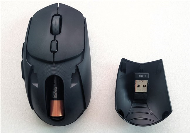 The mouse has a storage location for the wireless dongle