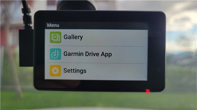 The dash cam is small and lightweight, but its LCD screen is large