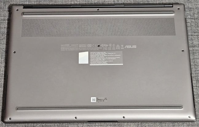 The bottom of the laptop features the air vents and the speakers