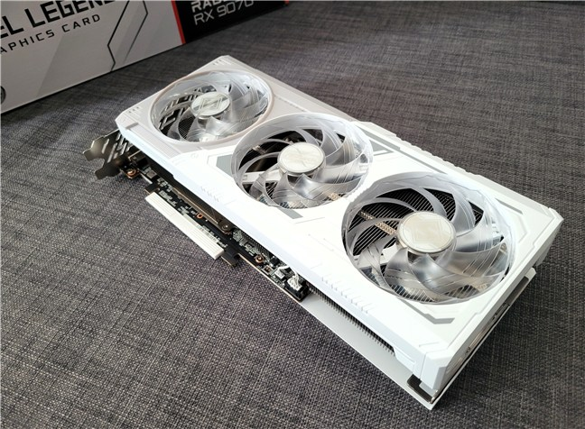 The card features a white design with translucent fans