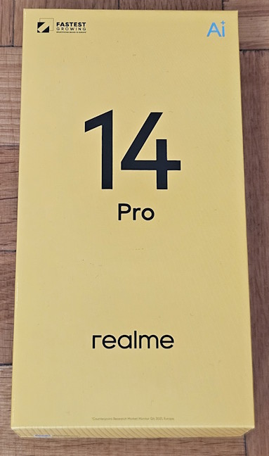 Realme 14 Pro comes in a yellow cardboard cox